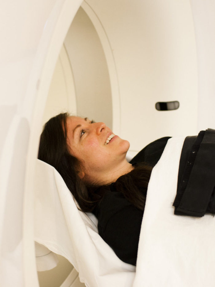 young girl going into MRI machine