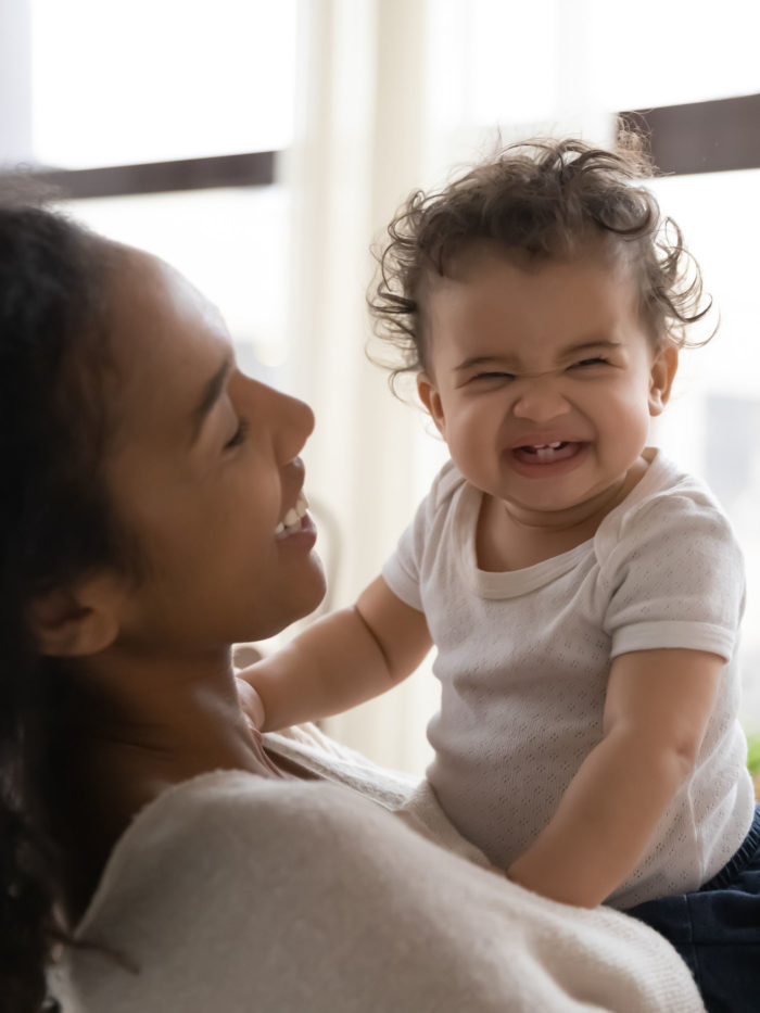 happy baby with mom