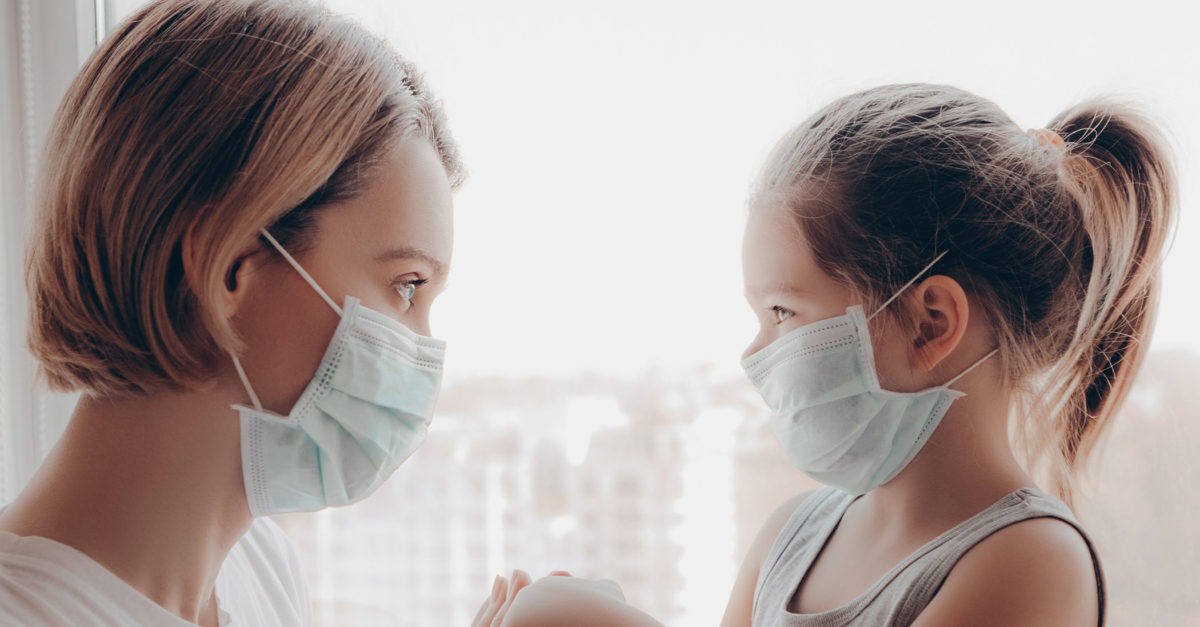 Family Mom and Daughter in Medical Mask