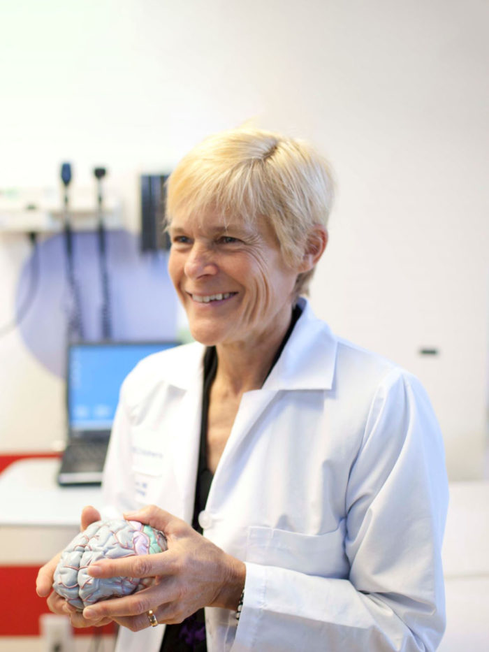 Dr. Mary Zupanc with model brain