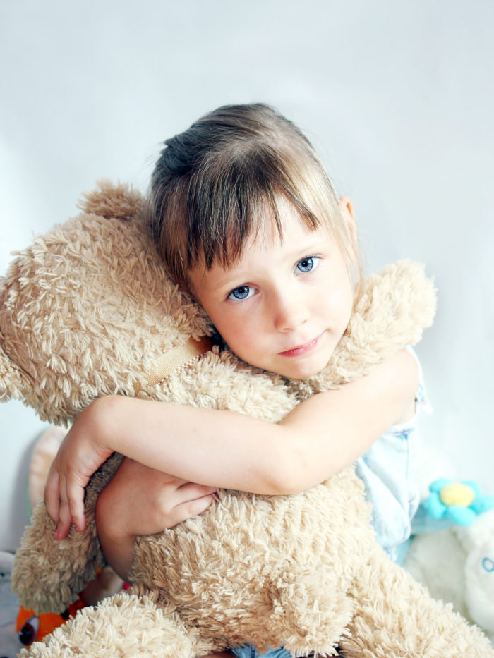 Little girl with bear