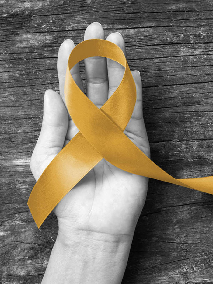 Childhood cancer awareness gold ribbon