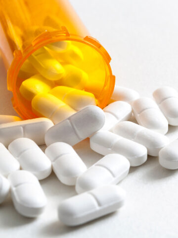 Bottle with pills spilling out - strategies for physicians for opiate prescribing