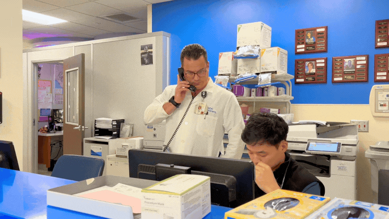 Dr. Heyming with a resident during his ED shirt at Rady Children's Health Orange County 