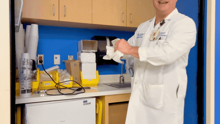 Dr. Heyming washes hands in the emergency department at Rady Children's Health
