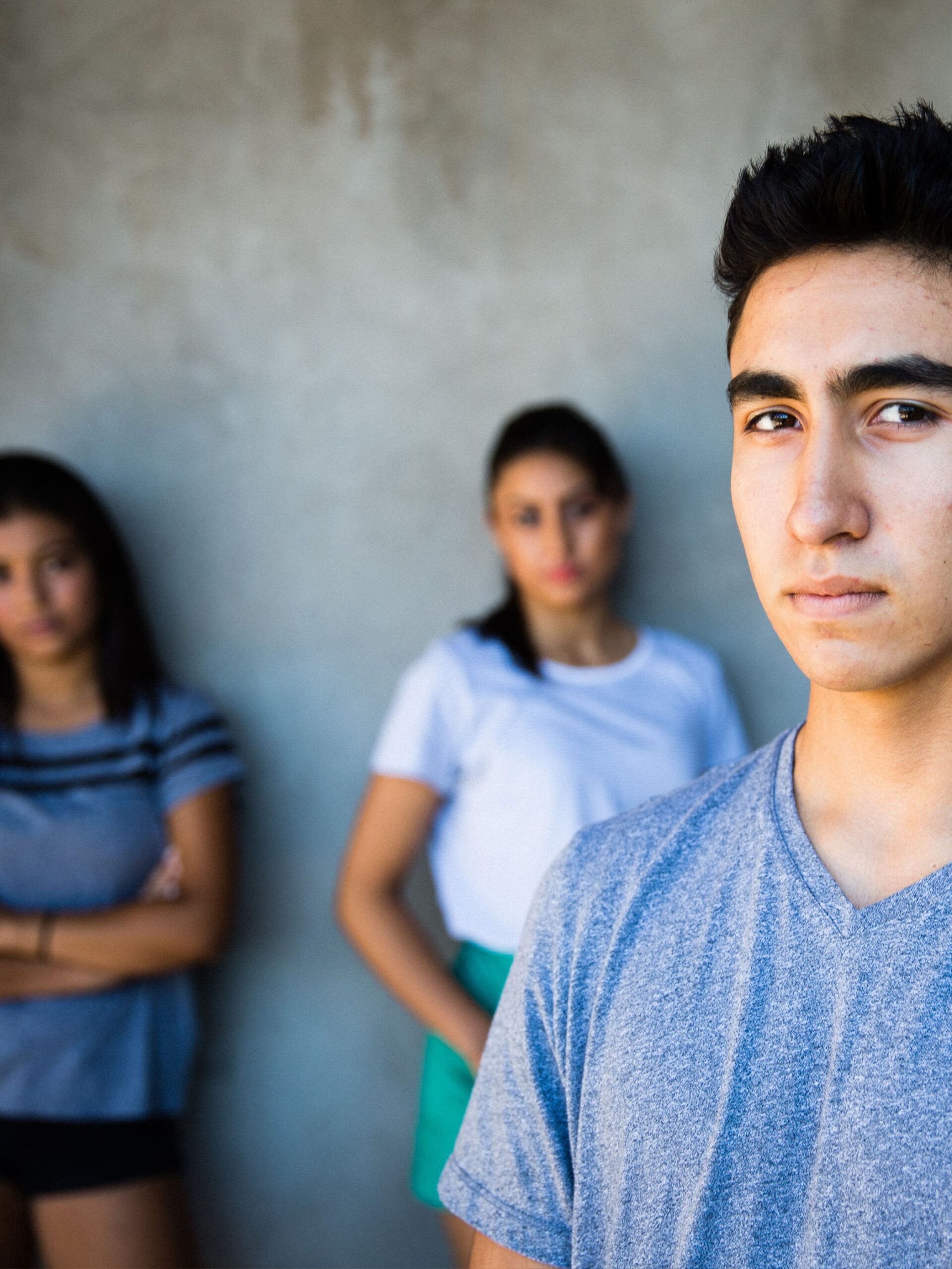 Three pensive teens
