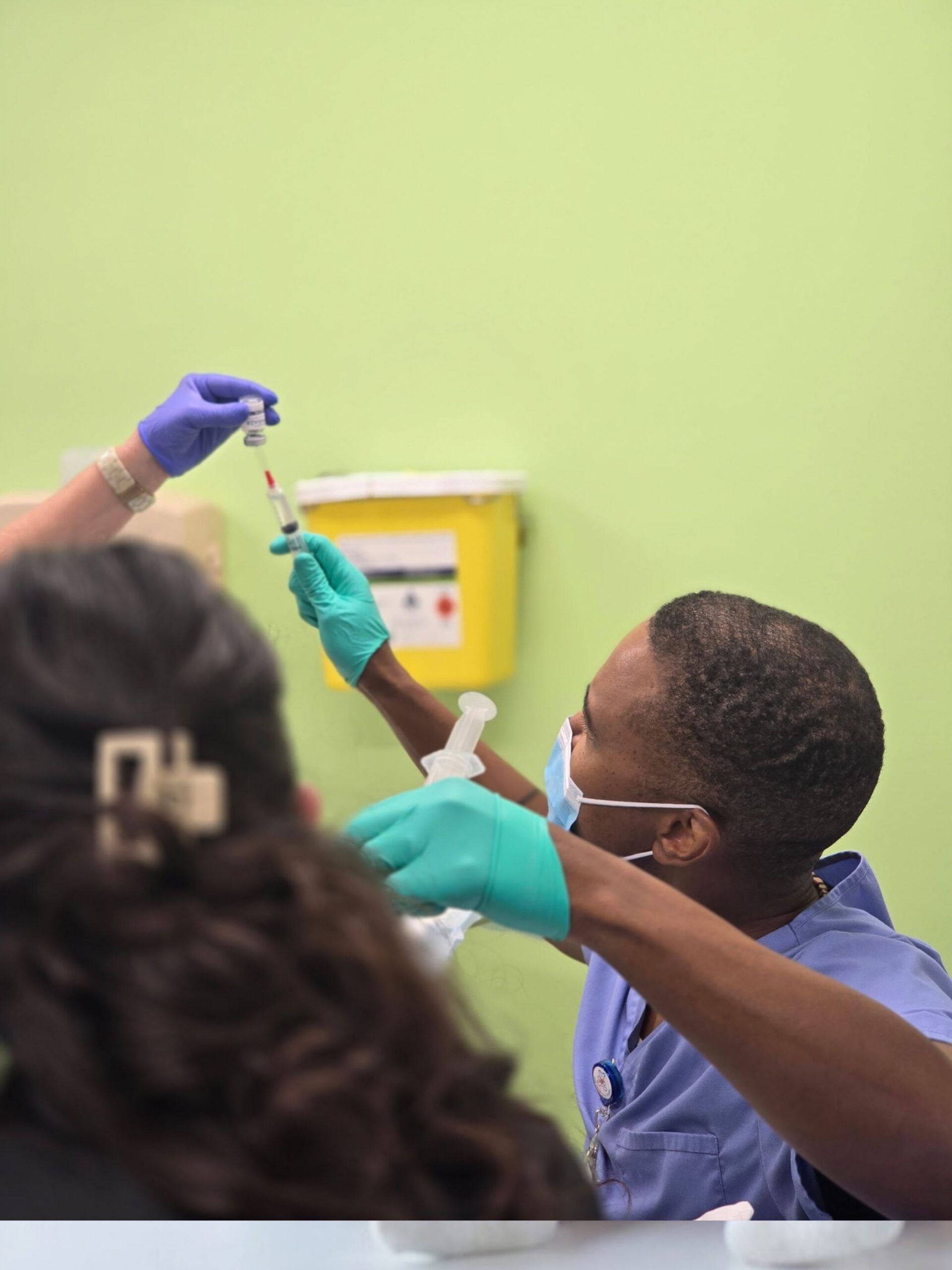 Doctor preparing an injection